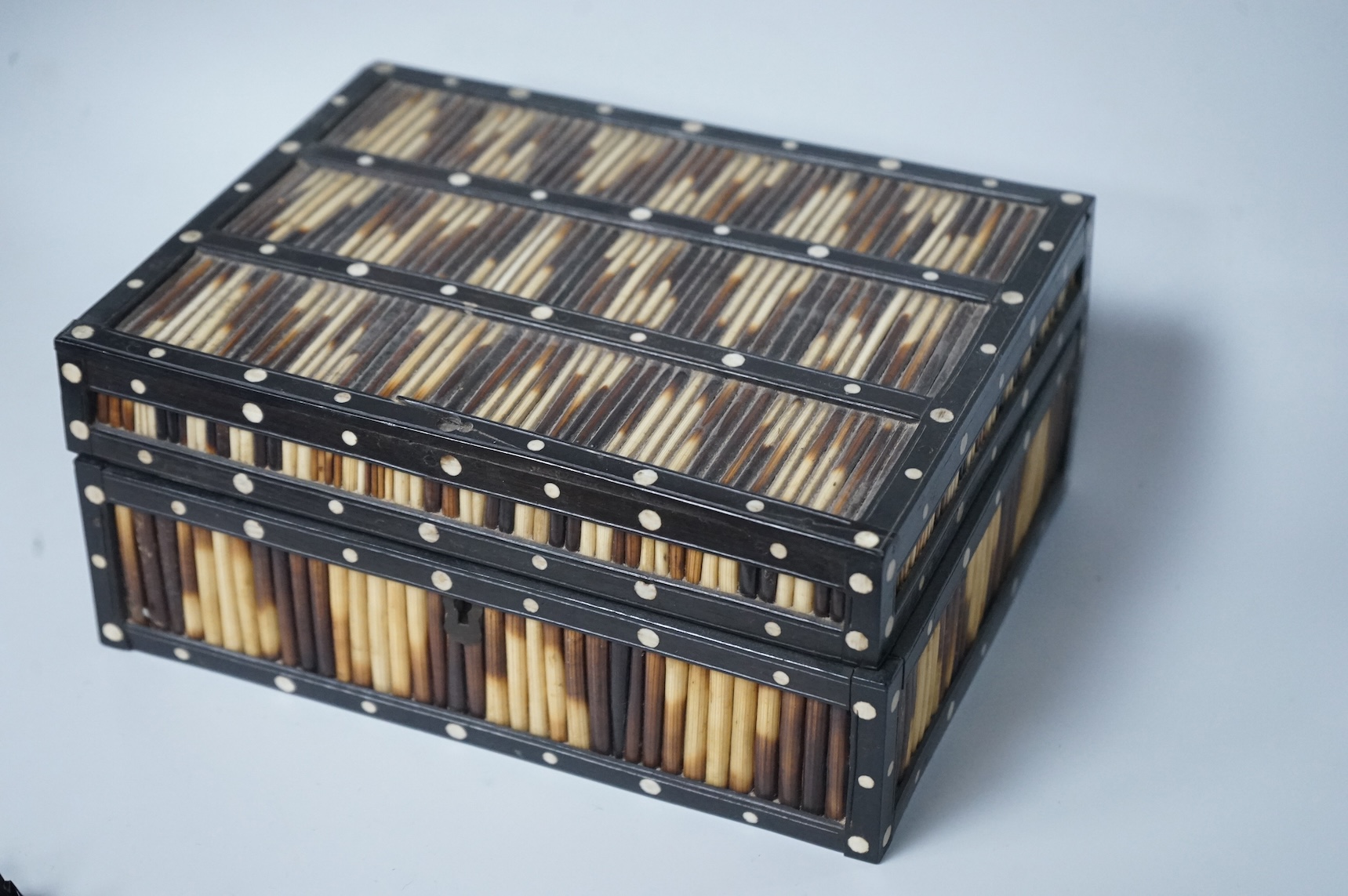 Two Ceylonese porcupine quill boxes, largest 20cm wide